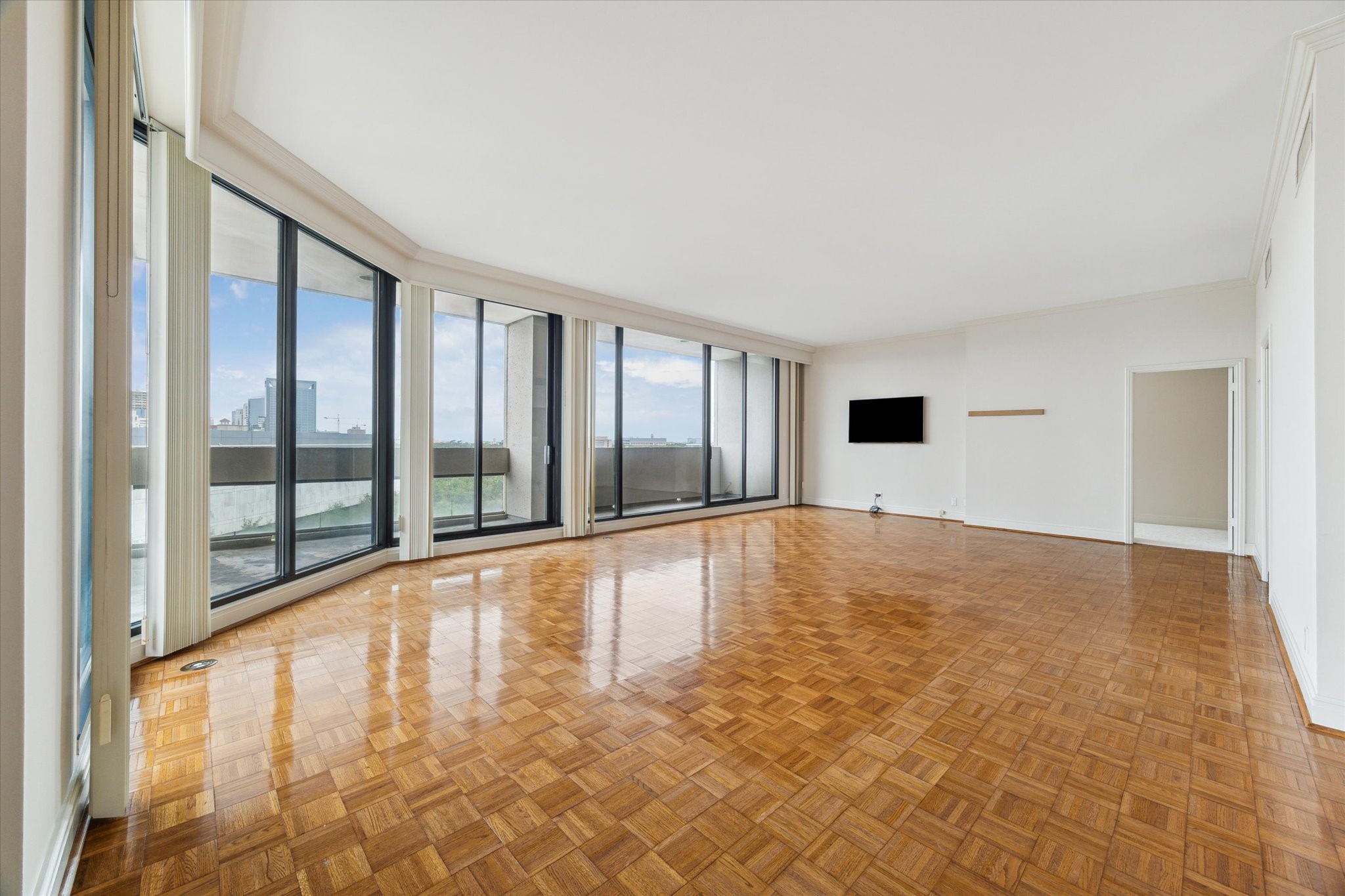 1111 Hermann Drive, Unit 7F Houston, TX 77004 - Photo 1 of 42 a large white building with a large window