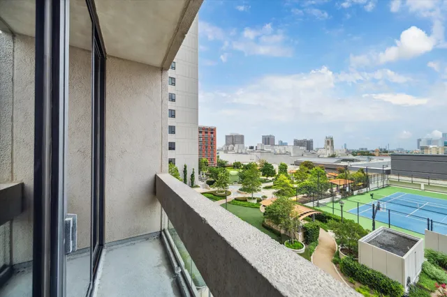 a bathroom with a sink double vanity granite toilet and shower