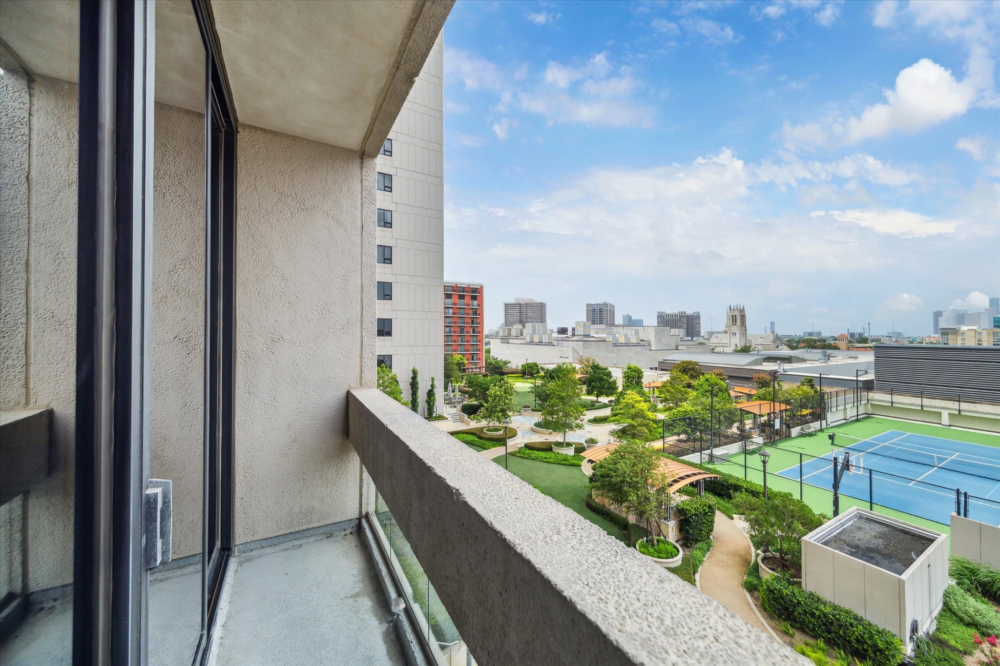 1111 Hermann Drive, Unit 7F Houston, TX 77004 - Photo 16 of 42 a view of a balcony with city view