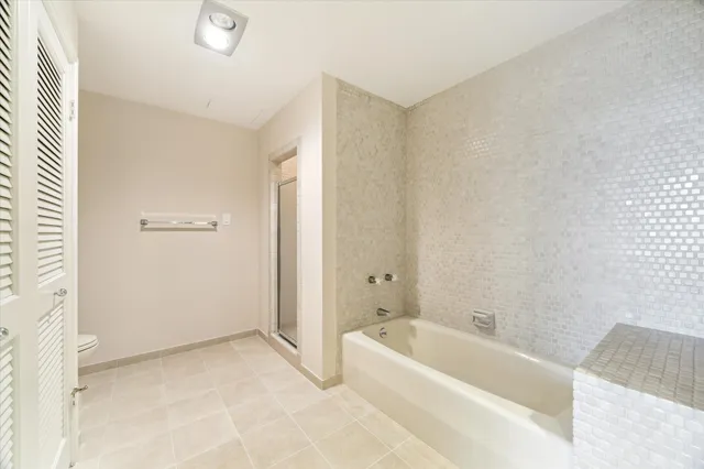 a bathroom with a double vanity sink mirror and double