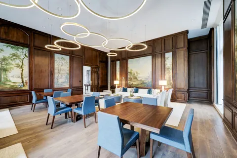 a view of a chairs and table in patio