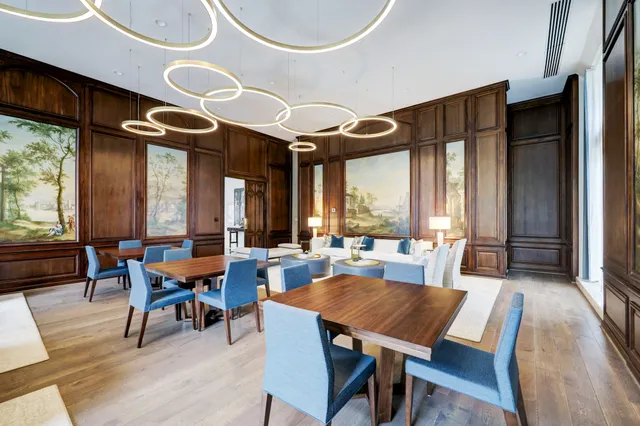 a view of a chairs and table in patio