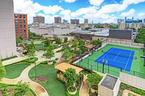 a view of a swimming pool with a lounge chair