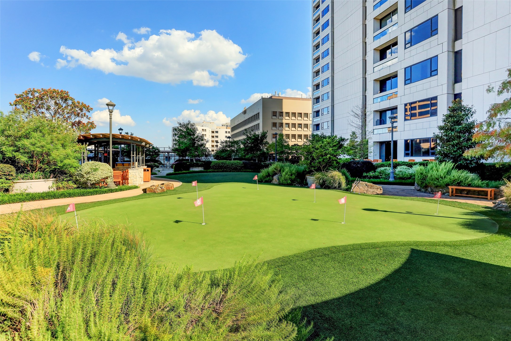 1111 Hermann Drive, Unit 7F Houston, TX 77004 - Photo 32 of 42 a view of a fountain in front of a building