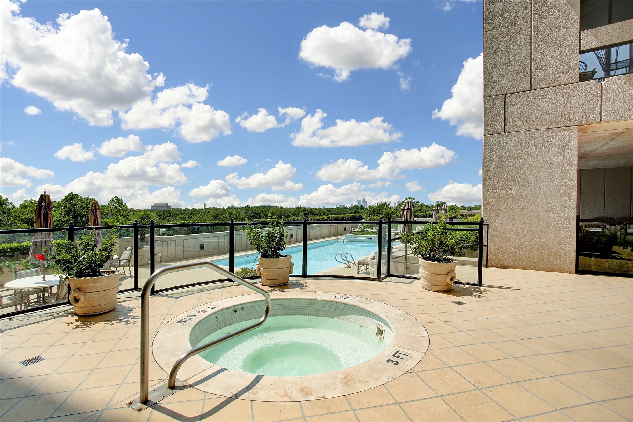 1111 Hermann Drive, Unit 7F Houston, TX 77004 - Photo 34 of 42 a view of a swimming pool with a lounge chair