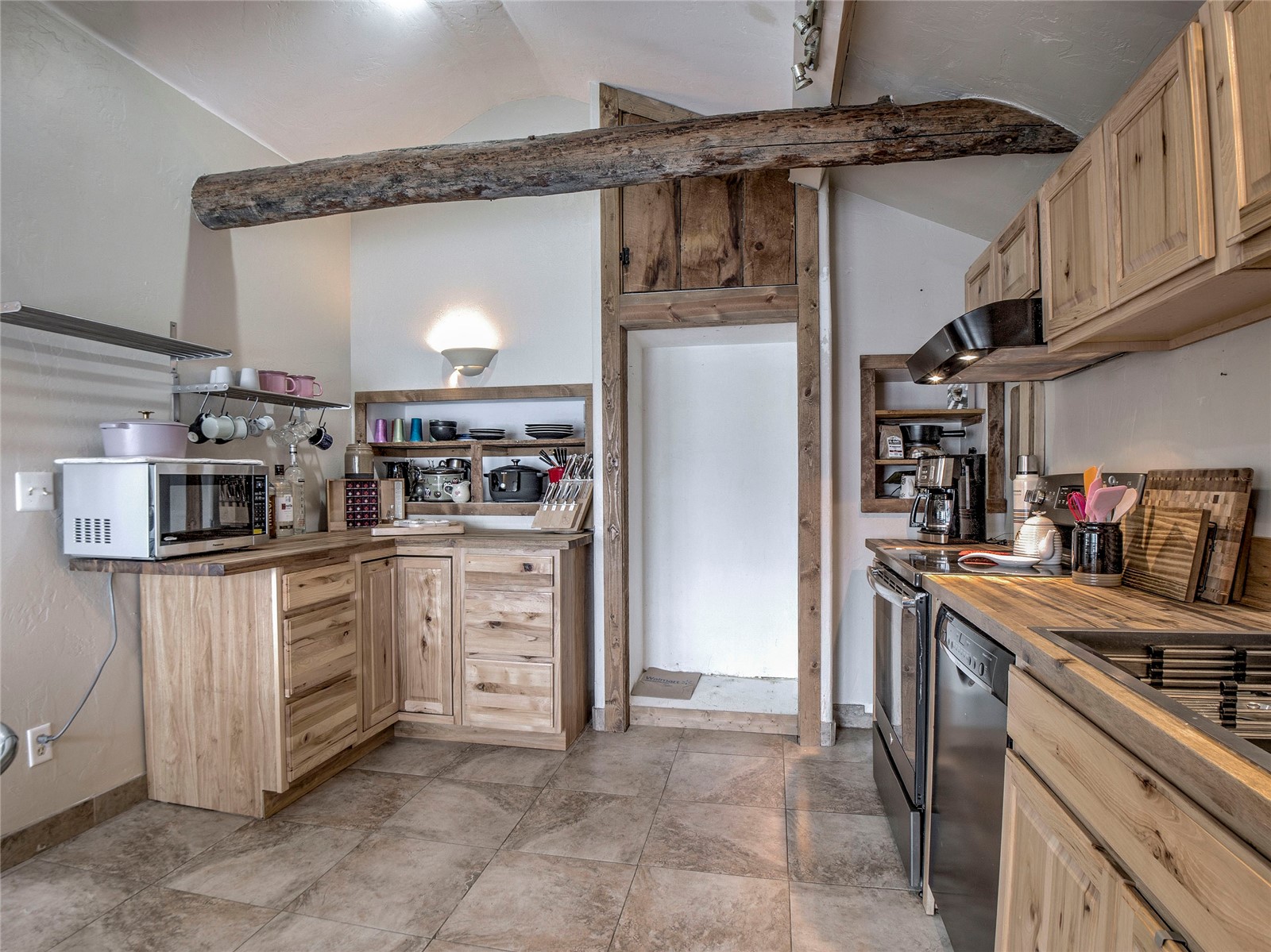 46 Singleton Road Alma, CO 80420 - Photo 10 of 50 a kitchen with white cabinets and appliances