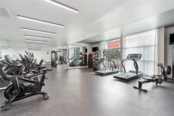 a view of a room with gym equipment