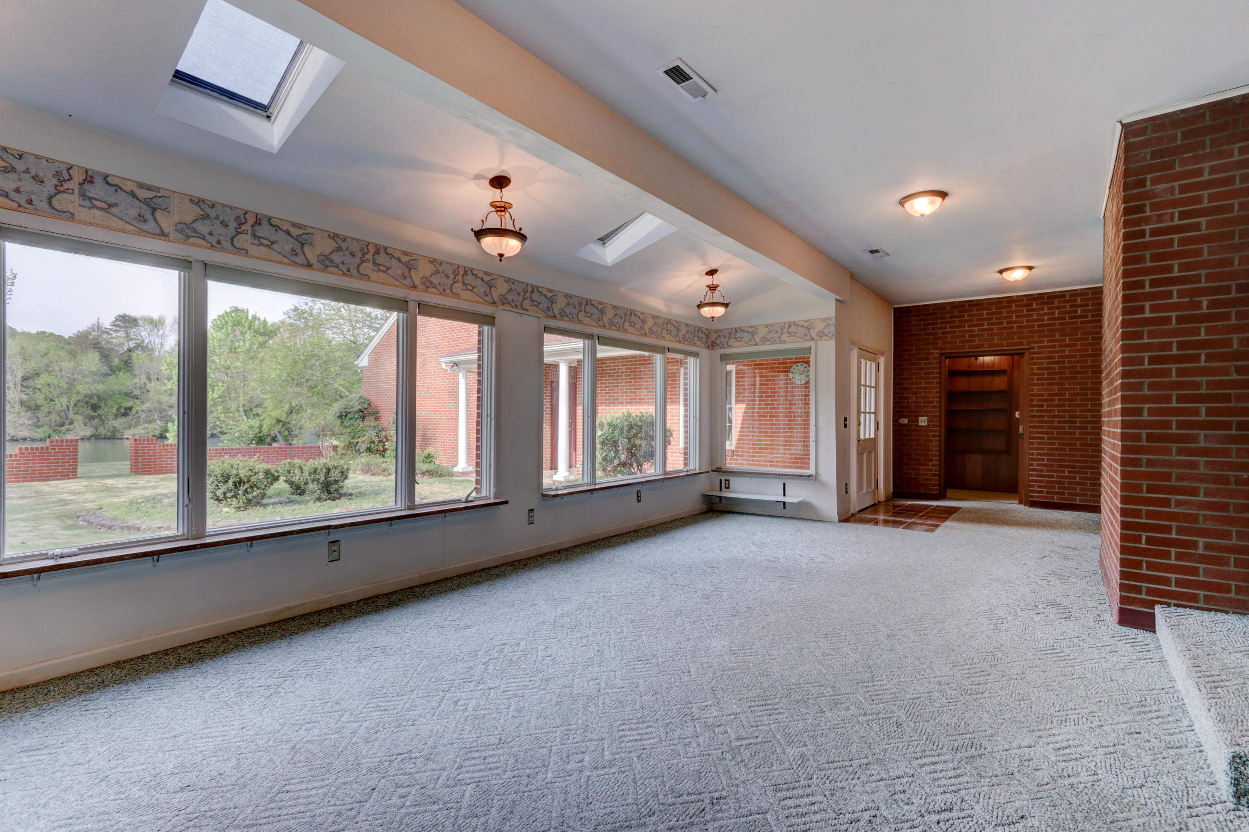 800 Riverbend Road Clinton, TN 37716 - Photo 22 of 32 Sunroom with View of River