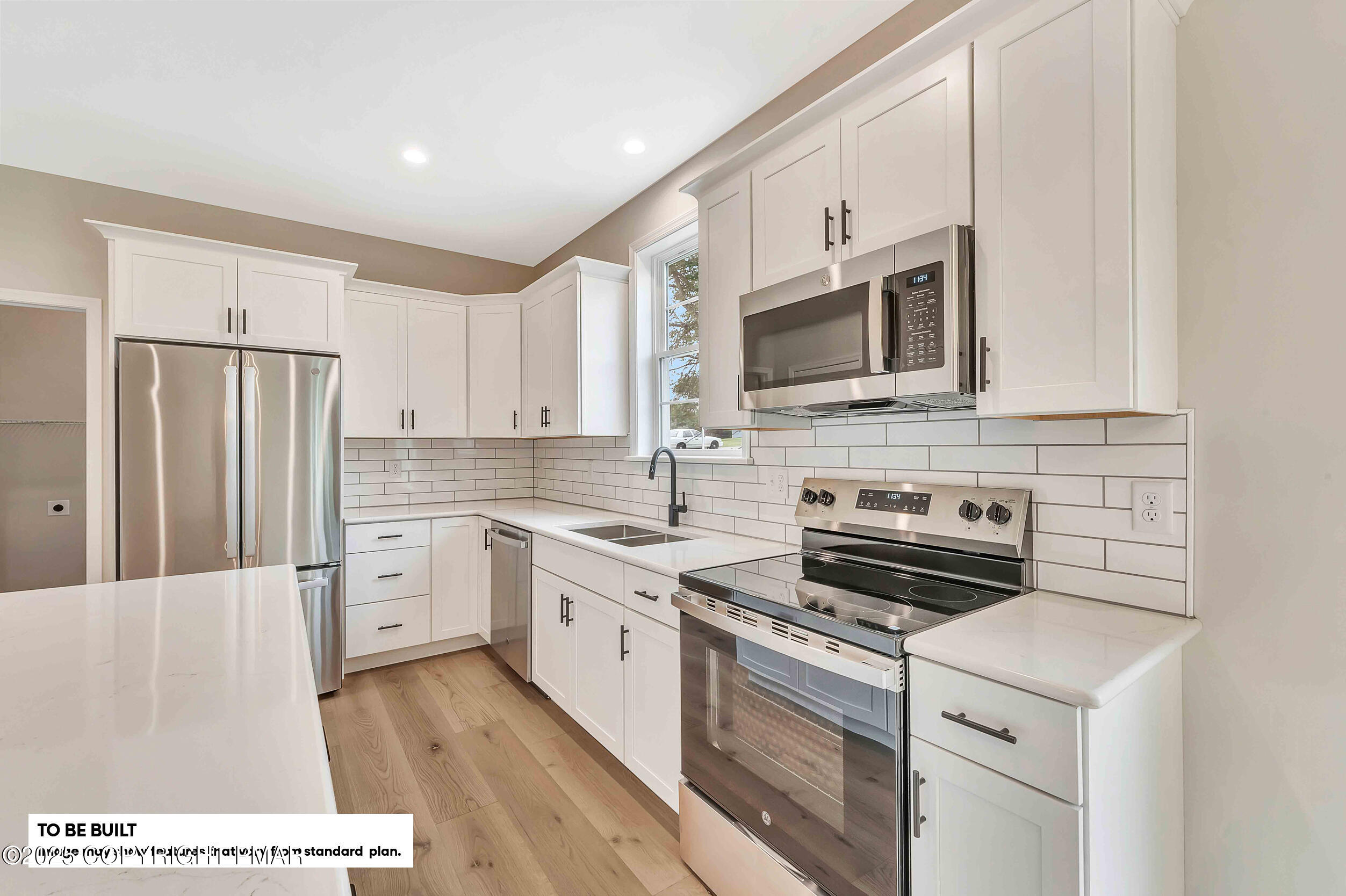 0 Phillips Street Stroudsburg, PA 18360 - Photo 4 of 12 a kitchen with stainless steel appliances granite countertop a stove a sink and a microwave