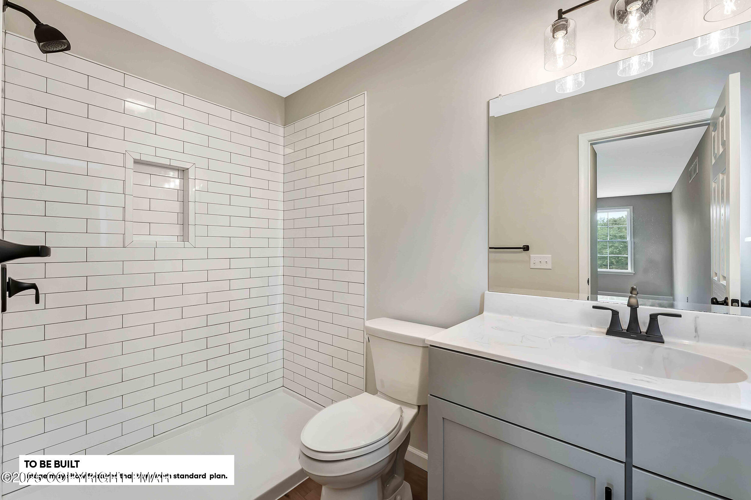 0 Phillips Street Stroudsburg, PA 18360 - Photo 8 of 12 a bathroom with a toilet a sink and mirror