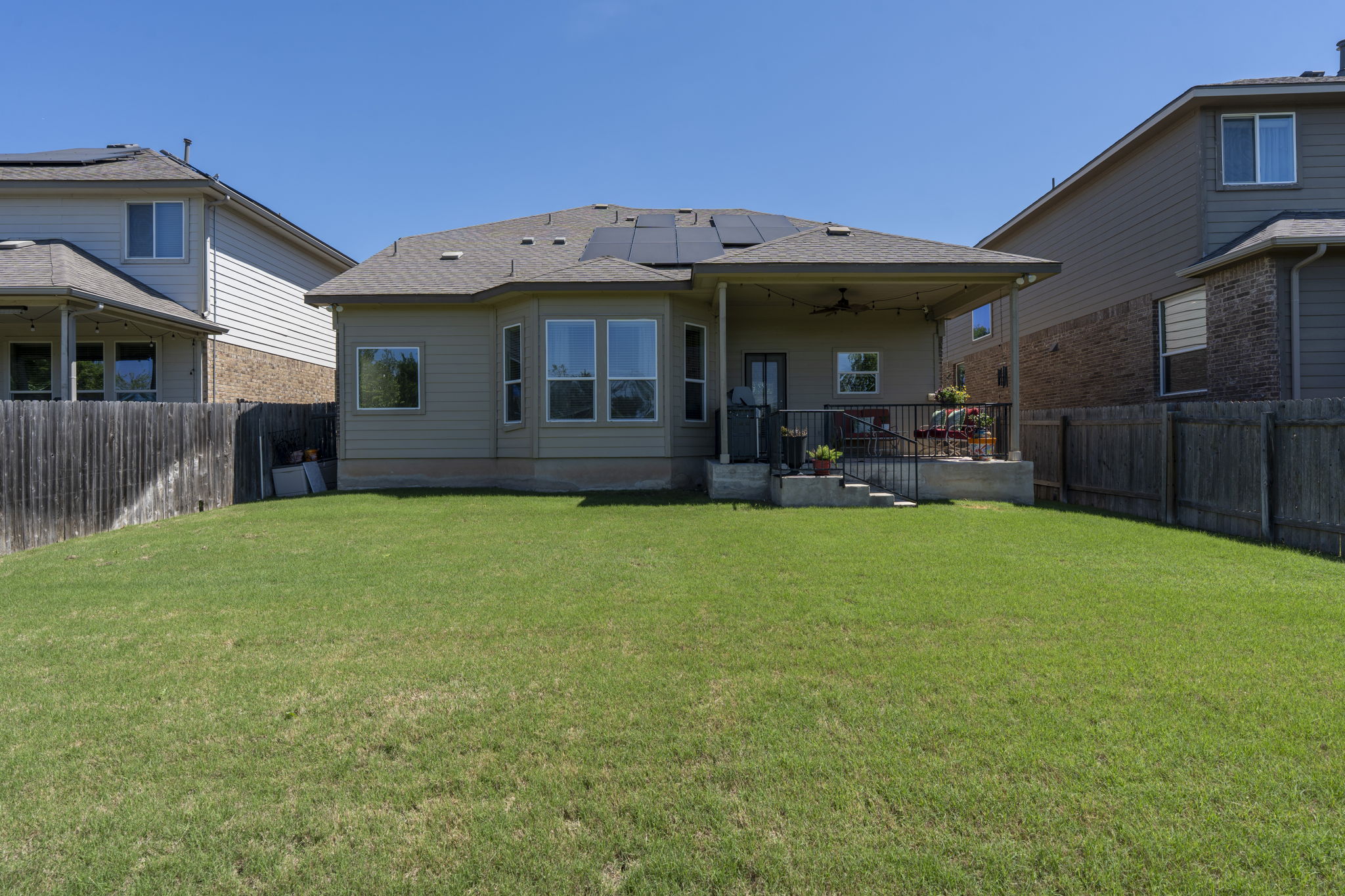 11412 Reading Way Austin, TX 78717 - Photo 29 of 35 a view of a house with backyard and porch