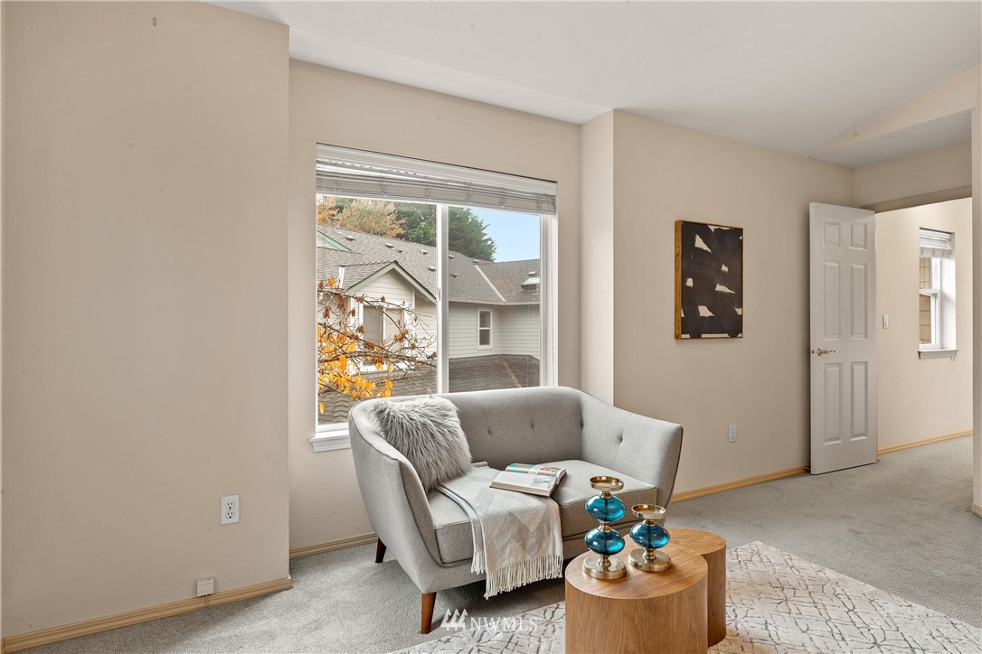 18704 20th Avenue Southeast Bothell, WA 98012 - Photo 14 of 27 a living room with furniture and a window