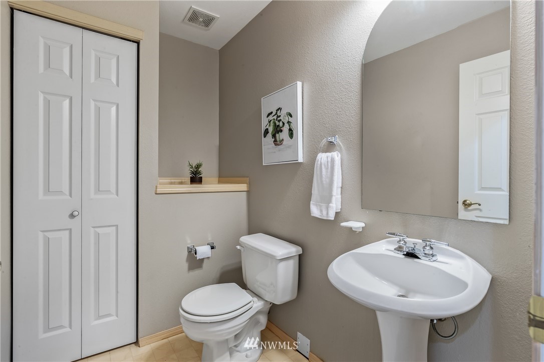 18704 20th Avenue Southeast Bothell, WA 98012 - Photo 20 of 27 a bathroom with a sink and a toilet