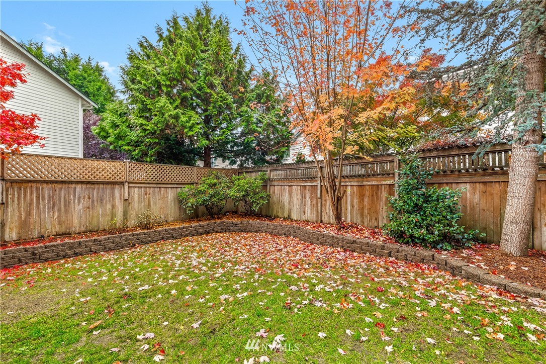 18704 20th Avenue Southeast Bothell, WA 98012 - Photo 21 of 27 a view of a backyard with a tree