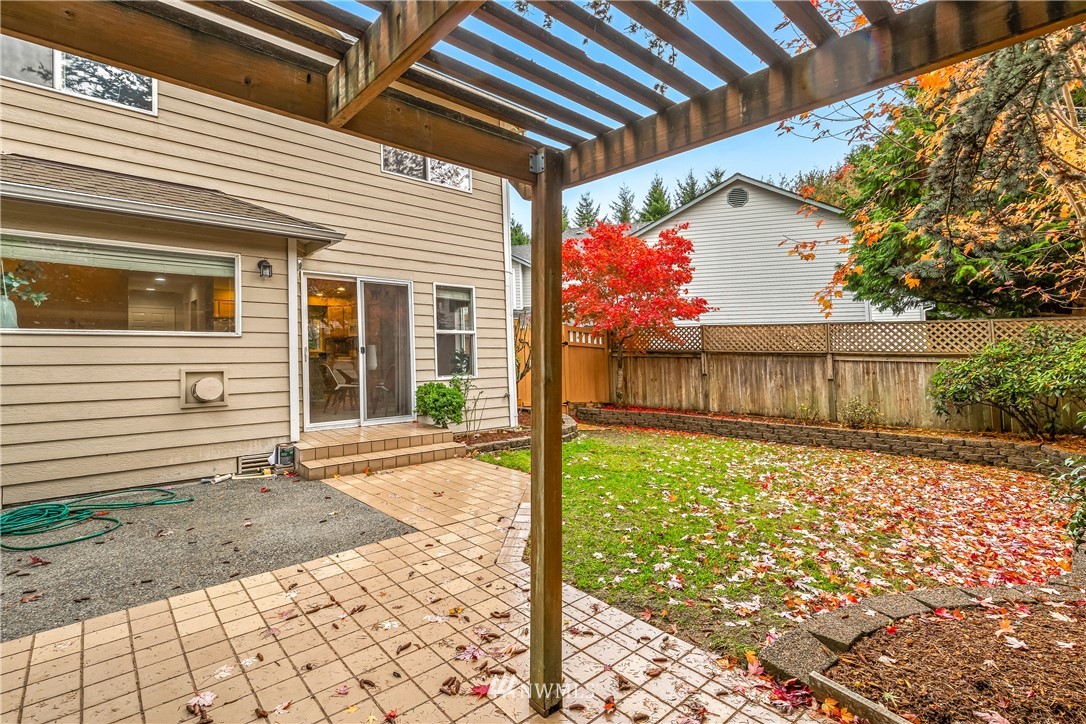 18704 20th Avenue Southeast Bothell, WA 98012 - Photo 22 of 27 a view of a backyard with a garden