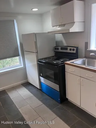 a view of kitchen and utility room