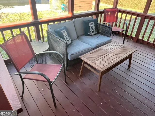a view of a chairs in the balcony