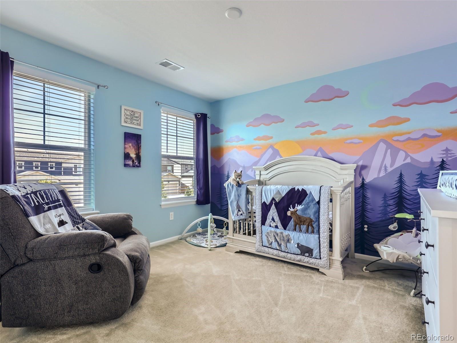 6430 Dry Fork Circle Frederick, CO 80516 - Photo 18 of 32 a living room with furniture and a window