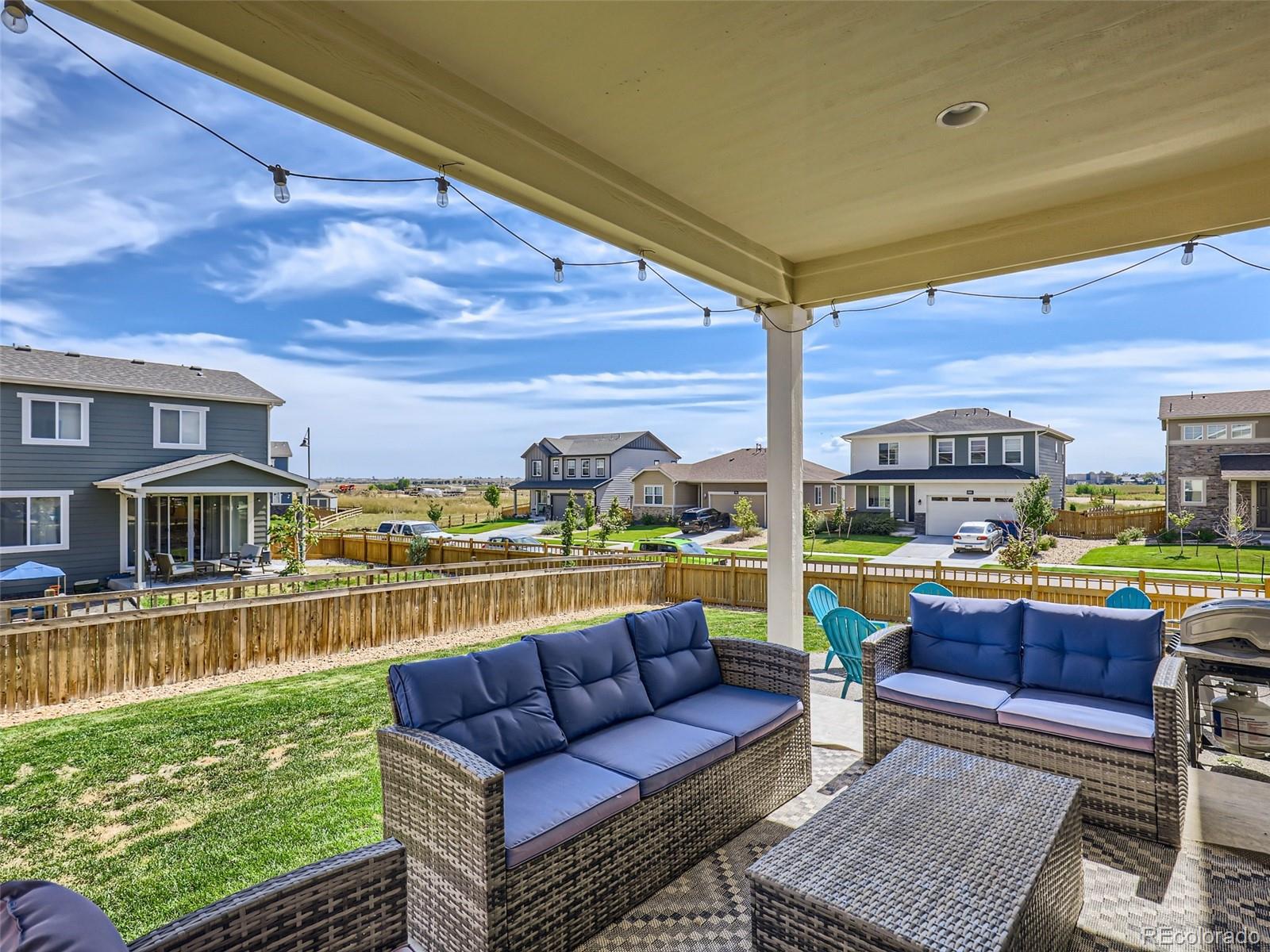 6430 Dry Fork Circle Frederick, CO 80516 - Photo 24 of 32 a view of swimming pool with outdoor seating