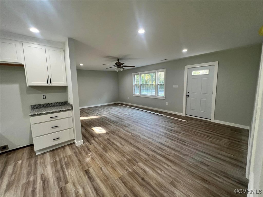 9427 Lebanon Church Road Jarratt, VA 23867 - Photo 4 of 16 Unfurnished living room featuring wood-type floori
