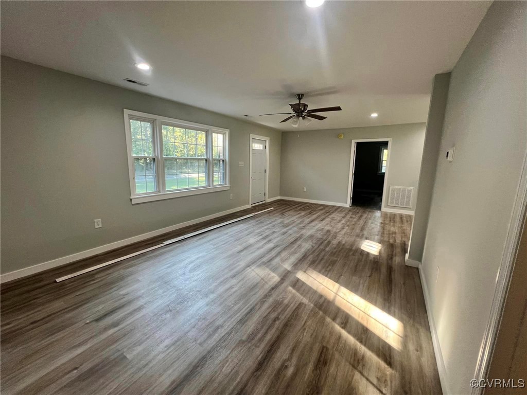 9427 Lebanon Church Road Jarratt, VA 23867 - Photo 6 of 16 Spare room with ceiling fan and dark hardwood / wo