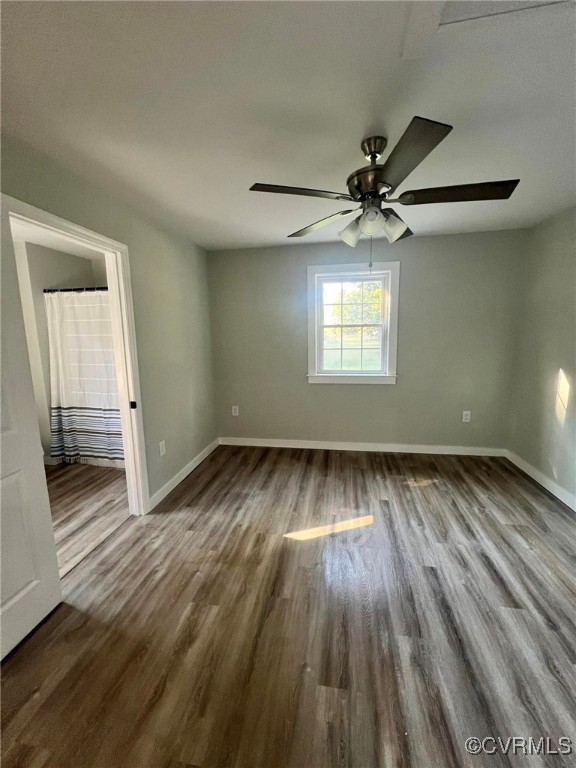 9427 Lebanon Church Road Jarratt, VA 23867 - Photo 8 of 16 Unfurnished room with hardwood / wood-style floors