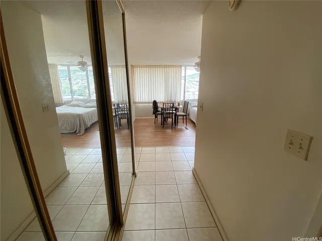 a stove top oven sitting inside of a kitchen