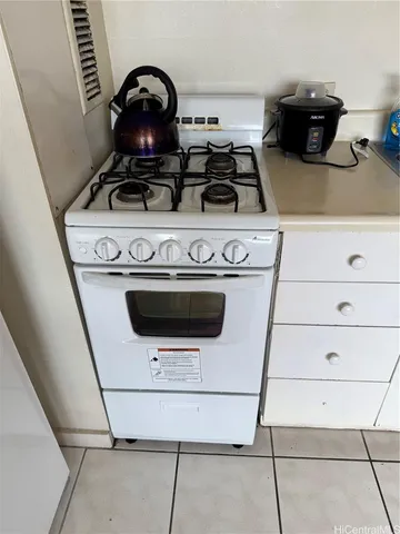 a bedroom with a bed and a table in it