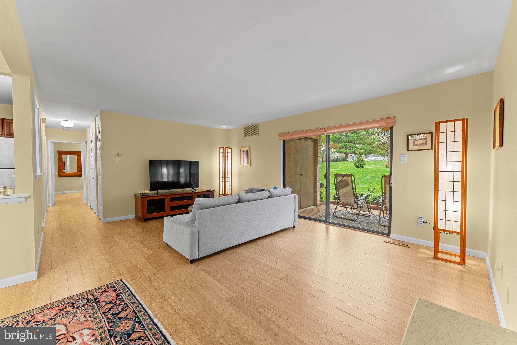 1704 Raintree Lane Malvern, PA 19355 - Photo 6 of 28 Spacious living rm w/ sliding glass to 1st deck
