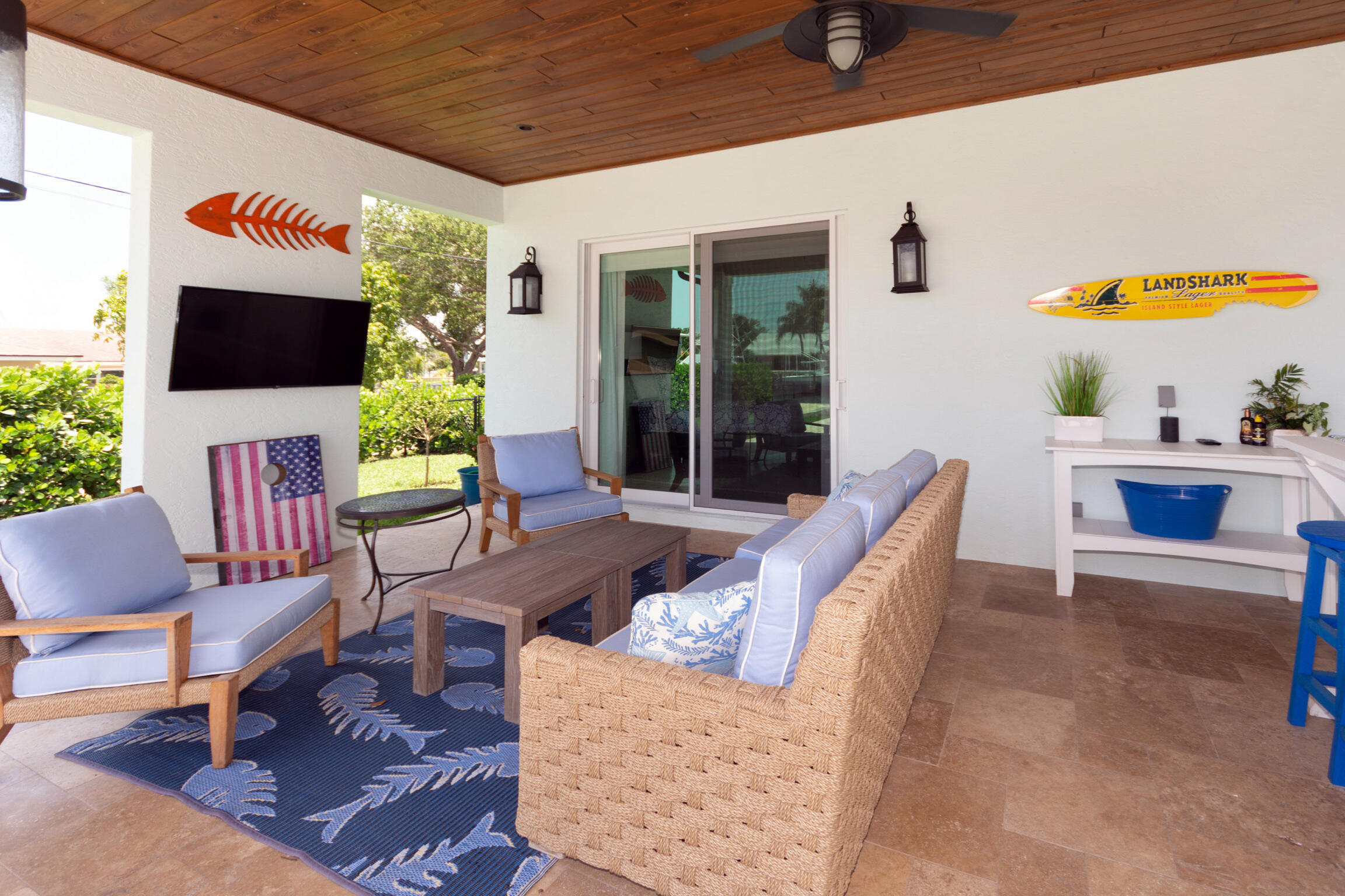 205 Body Court Jupiter, FL 33477 - Photo 54 of 75 Covered Outdoor Patio with TV