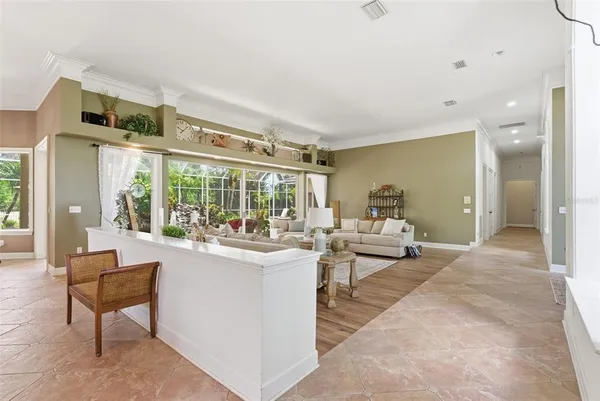 a large kitchen with stainless steel appliances granite countertop a stove and a sink