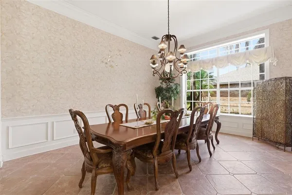 a living room with furniture and garden view