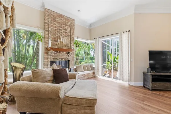 a living room with furniture and a window