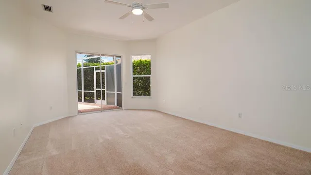a bathroom with a granite countertop toilet a sink and a bathtub