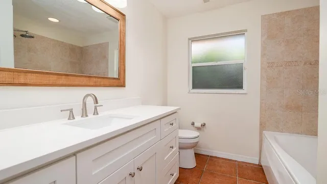 a view of a lake with a houses