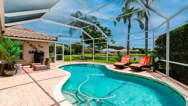 $599,900 | 5897 Carriage Drive, Sarasota, FL 34243