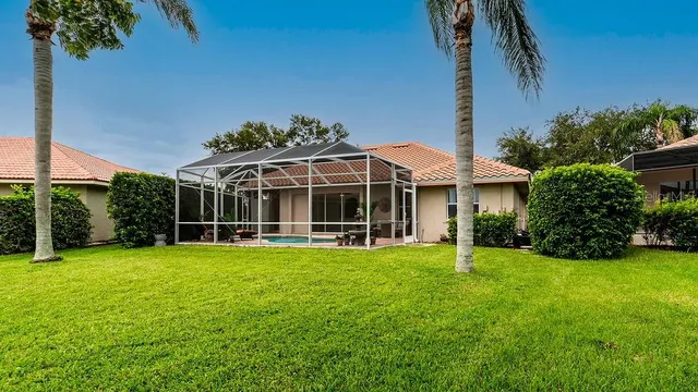 $599,900 | 5897 Carriage Drive, Sarasota, FL 34243