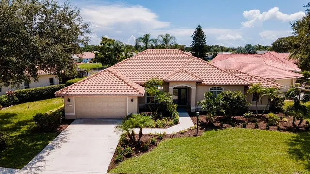 $599,900 | 5897 Carriage Drive, Sarasota, FL 34243