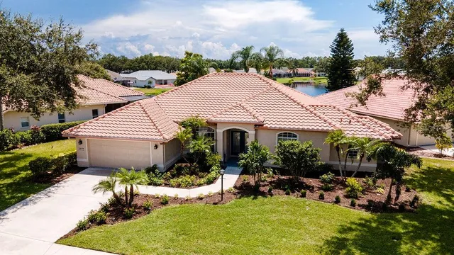 $599,900 | 5897 Carriage Drive, Sarasota, FL 34243