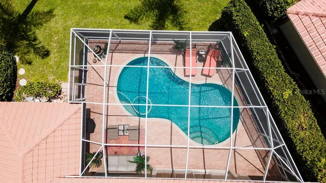 $599,900 | 5897 Carriage Drive, Sarasota, FL 34243