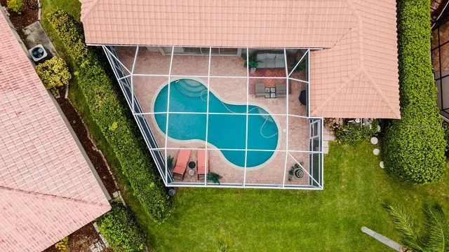 $599,900 | 5897 Carriage Drive, Sarasota, FL 34243