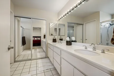 a front view of a house with garden and porch