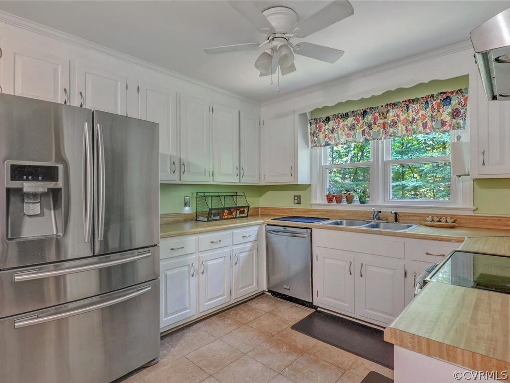 1909 Fairoaks Road Powhatan, VA 23139 - Photo 8 of 34 Freshly painted kitchen with tile floors, pantry a
