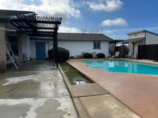 a view of a house with a swimming pool