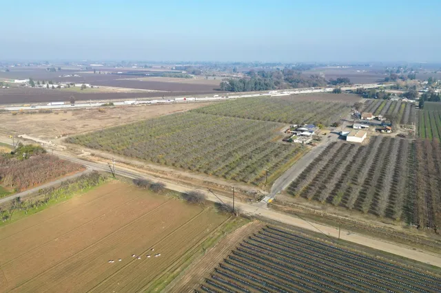 a view of an ocean and city