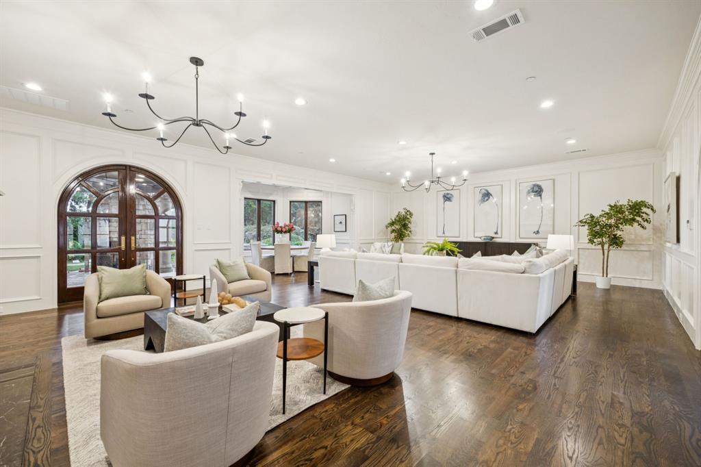 1900 Shady Oaks Drive Southlake, TX 76092 - Photo 19 of 40 a living room with furniture kitchen view and large windows