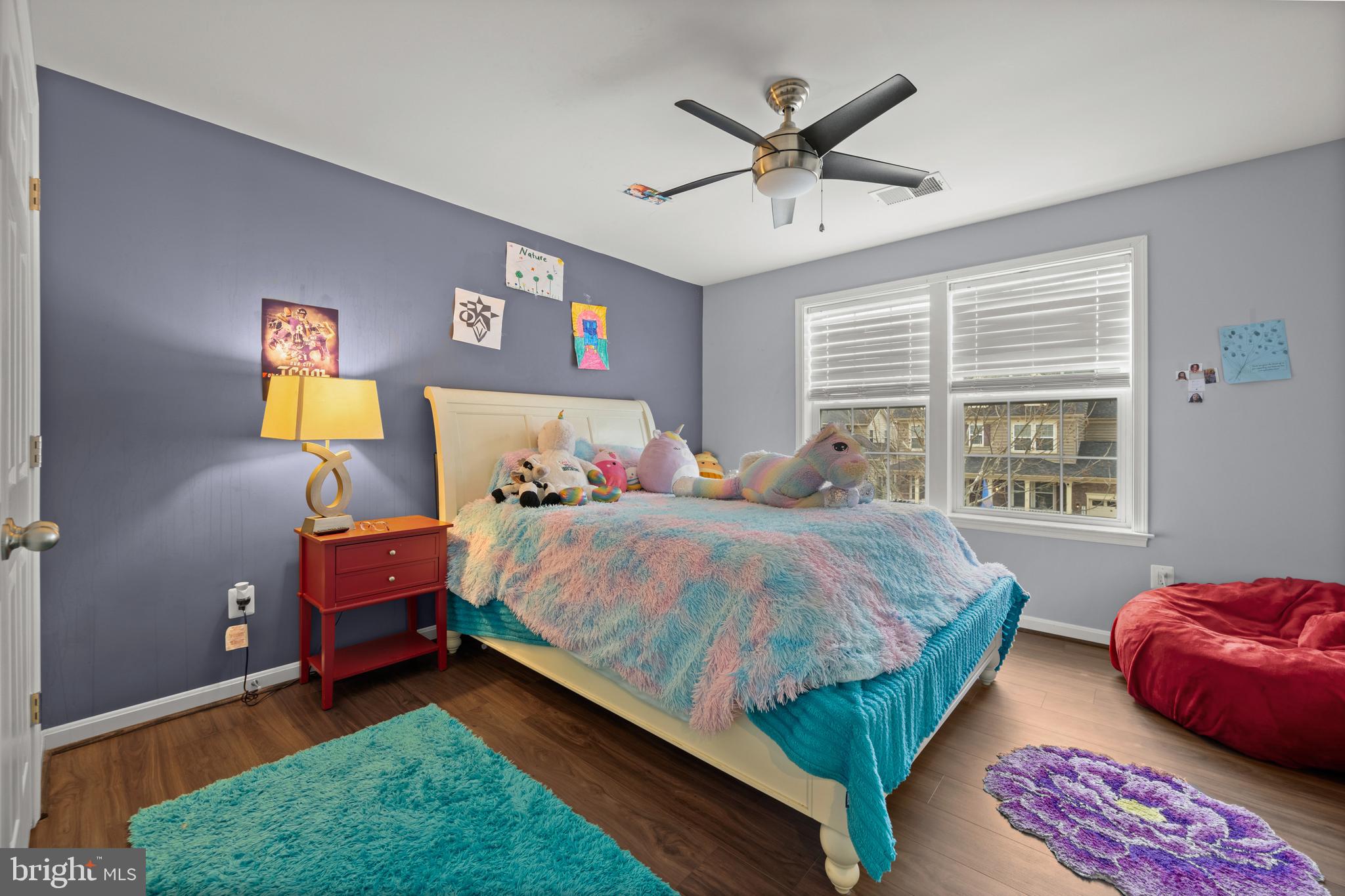 734 Holden Road Frederick, MD 21701 - Photo 21 of 46 a bedroom with a bed and a couch