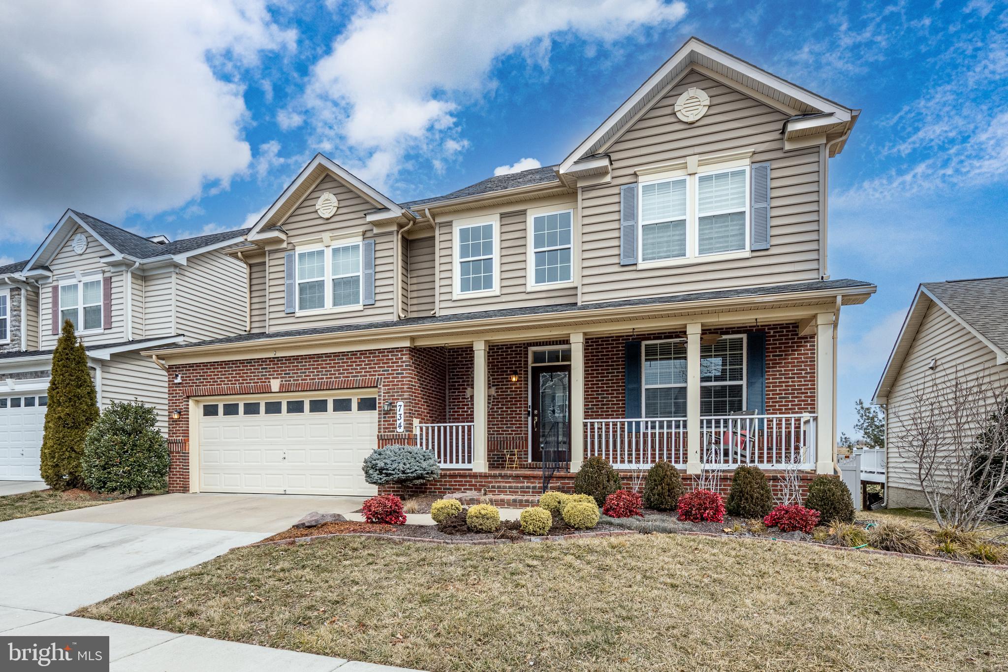 734 Holden Road Frederick, MD 21701 - Photo 4 of 46 a front view of a house with garden