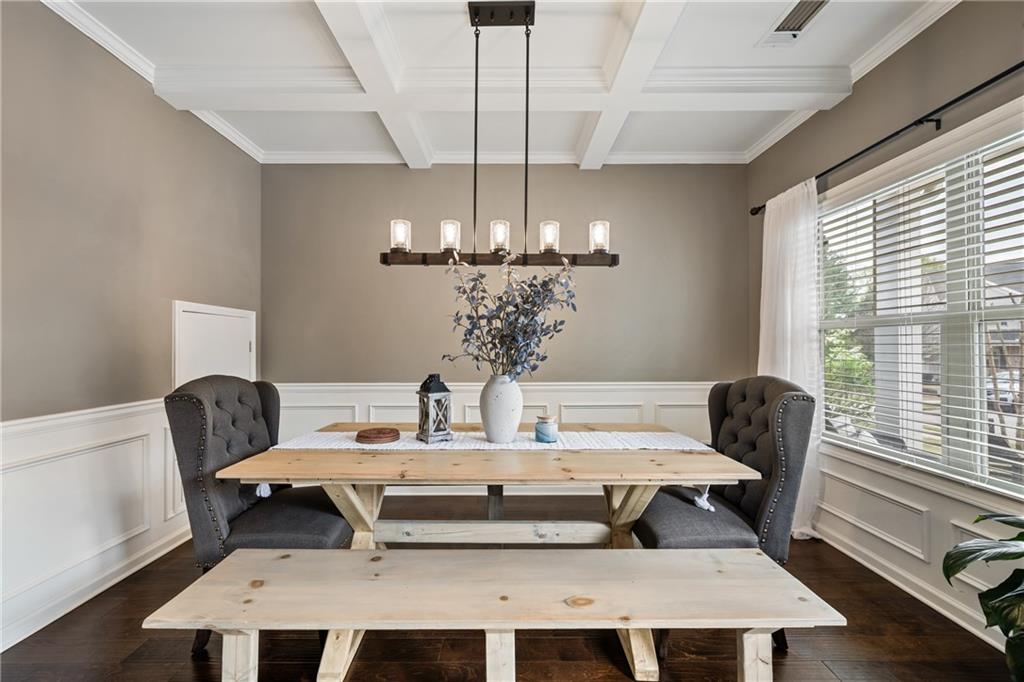 555 Evergreen Way Jefferson, GA 30549 - Photo 14 of 69 a view of a dining room with furniture and chandelier