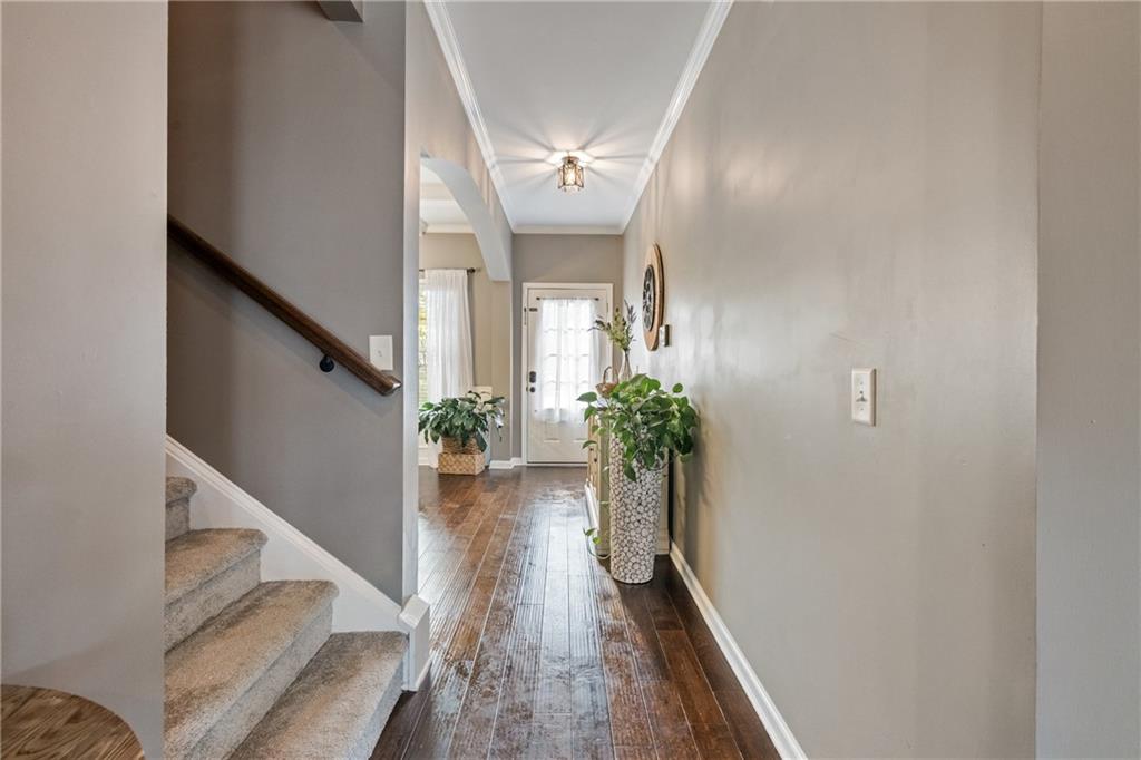 555 Evergreen Way Jefferson, GA 30549 - Photo 18 of 69 a view of entryway and hall with wooden floor